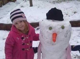 Jayde with her snowman my angels last Christmas
