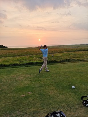 Teeing off on the 9th last summer. It wasn't one of his best, but the follow through was always text book