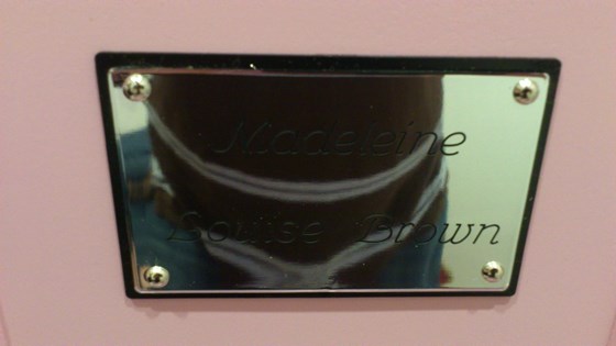 Name plaque on the coffin