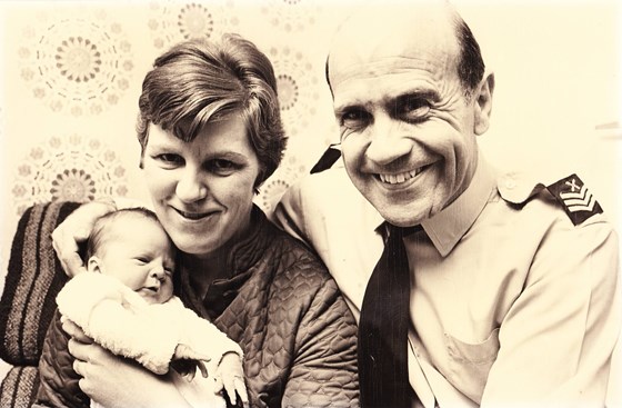 Dad in uniform with Mum and David 1977