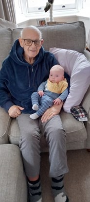 Cuddles with great grandson 