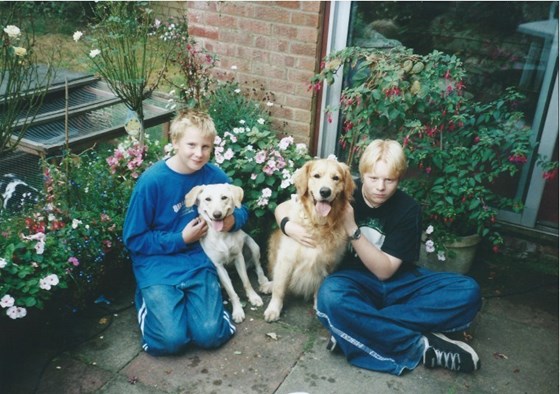 With his brother and the dogs