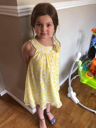 Lily in her yellow daisy dress