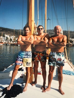 Peter on his boat with Mike and Simon.