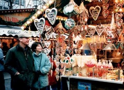 Bill and Andrea admiring the sweets at the Christmas market in Germany