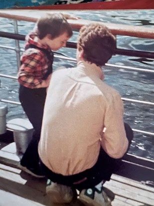 Trev and our Son Mark on the Windermere Ferry, camping holiday in 1978.