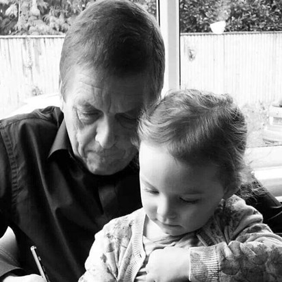 Evie drawing pictures with help from Grandad Tony. xxx