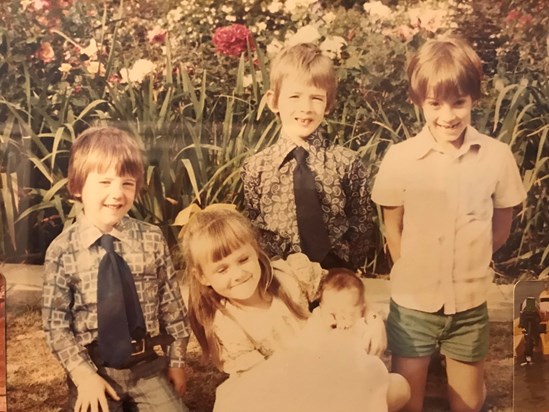 Beth the baby at her Christening with her older cousins