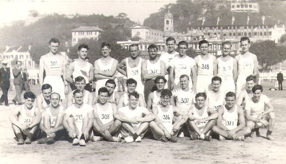 1949 cross-country team, Hong Kong. He's the fourth handsome chap at front.