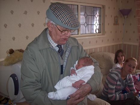 grandad(your dad) holding demi.