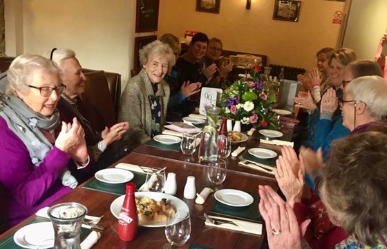 Much loved Dorothy receiving congratulations in the pub on her 90th birthday. 