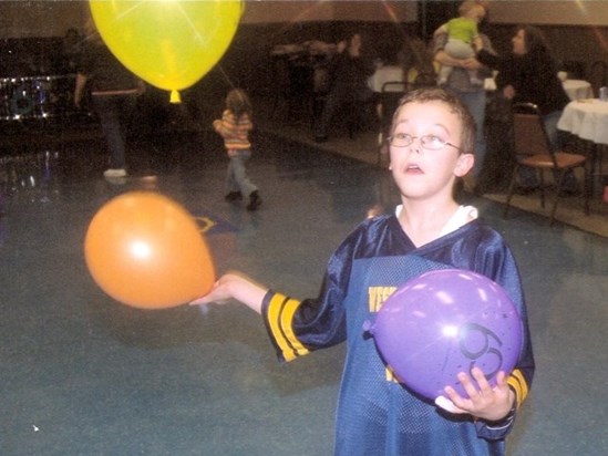 Little Brian Juggling Balloons