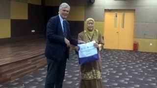 Prof making a presentation at Newton workshop in Malaysia