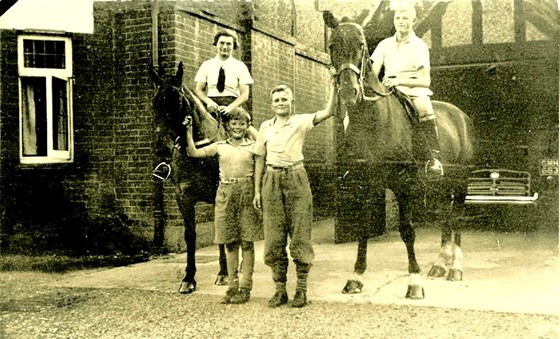 Mum and John (Mounted) and two lads.