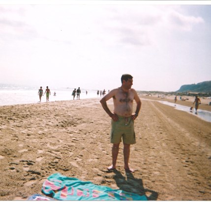 Dad on beach in Alicante in 2000s