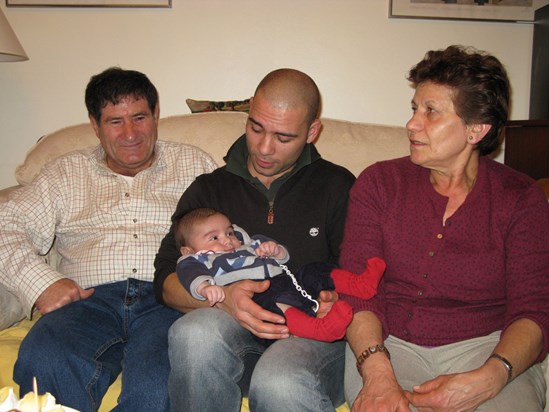 Dad with grandson, one of his godfathers and mum in Tottenham - London in 2009 