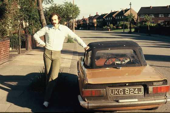 alan showing off his pride and joy to his dad! 1970's
