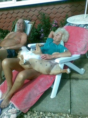 Charlee Bella helping my Mum to sunbathe in her garden FB IMG 1673705019172