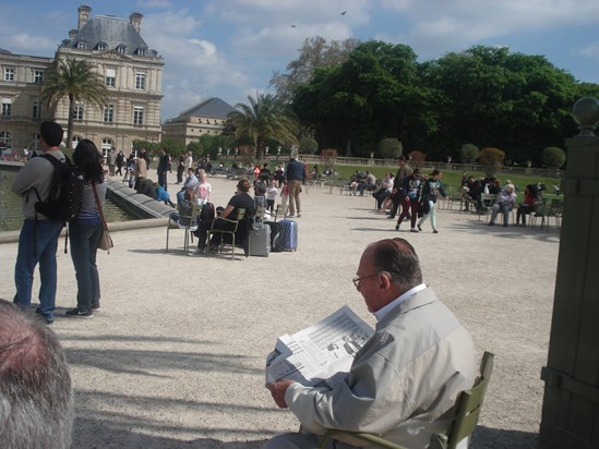 As usual reading his paper in sunny Paris