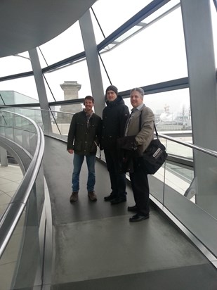 Team building in Berlin in January. He was sure the Bundestag was the right place to do this ... turns out it is completely open to the weather and it was -3C and windy that day. Still smiling though!