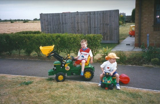 Rob & Kieran swapping tractors Aug 98 