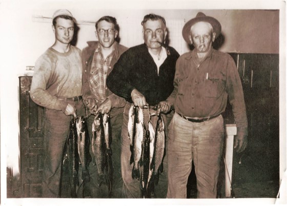 Glen Barcus On left), Dr. Wayne Barcus (2nd from left), and their father, Harry Barcus (far right)