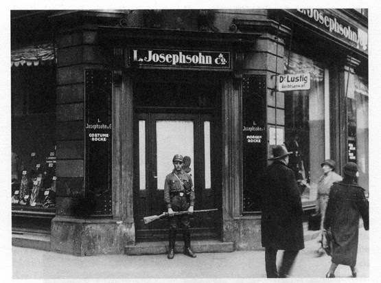 Picture of the Shingle from Dr. Adolf Lustig in Munich Germany outside the Josephsohn store, April 1933
