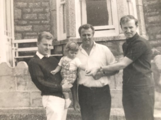 Bernard holding Julie, Dougie and Michael outsade Aunt Keren's