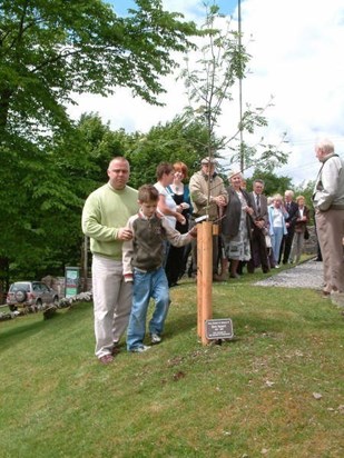 Bob's brother Andy with Bob's eldest son Steven at the dedication of trees in Bob's memory.