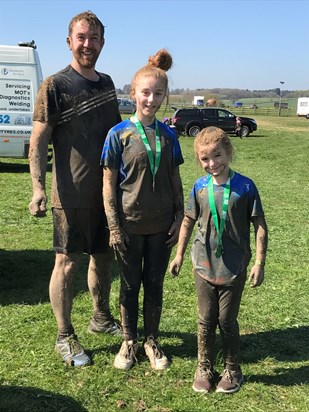 Very muddy after completing the 9km mini military mud run with the kids