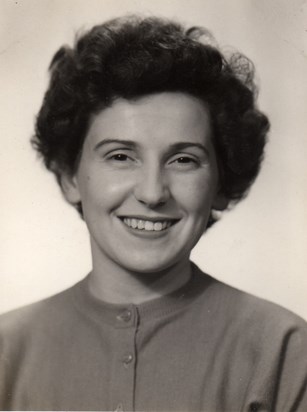 June W K passport photo 1957