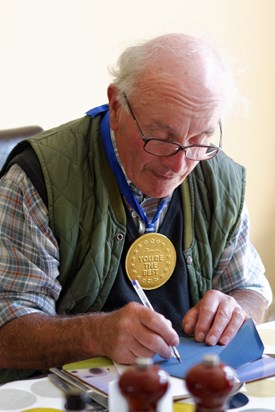 Still concentrating (despite the medallion)