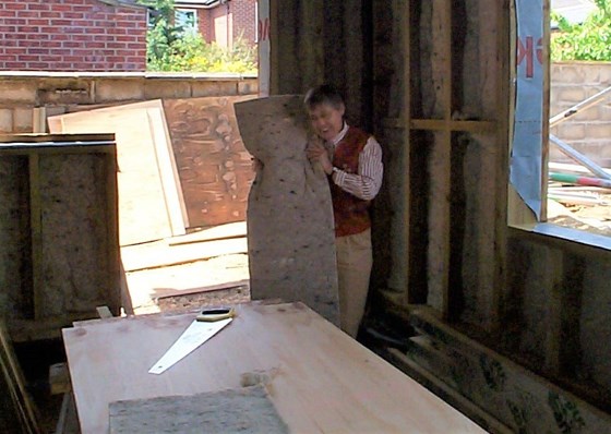 Averil delighted with the wool insulation for her Eco renovation, 2006