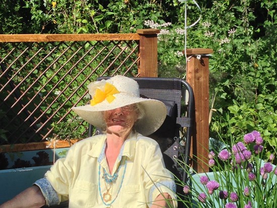 Always elegant Jill, enjoying her garden in the sunshine.