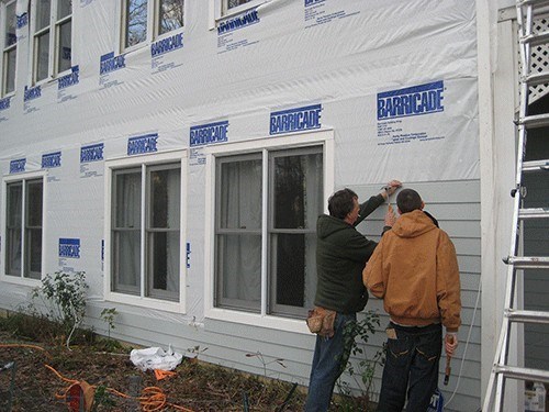 Brian and Dad Siding a Home