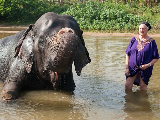 Sonia and bathing elephant in Tamil Nadu, India 2009