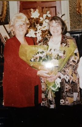 Pam presenting Marilyn with a bouquet of flowers at Cyfarthfa Castle