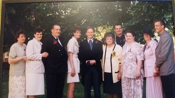 A picture of the family including Martin looking at his best at Steven and Becky's wedding