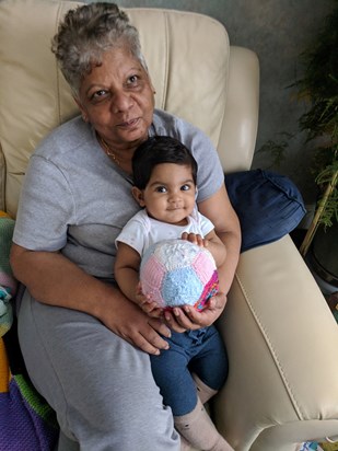 Aariya loves the ball Grandma knitted for her. 