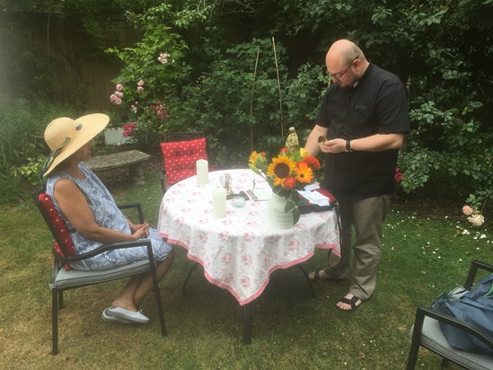 Private mass by Father Peter in the garden 