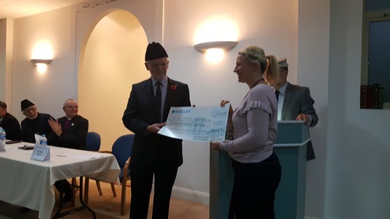 Presentation of a cheque in Kevin's name by the Nasir Mosque in Hartlpool