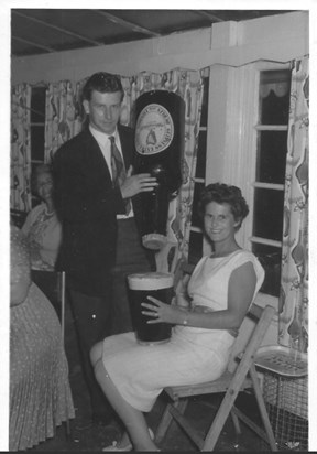 BRENDA AND JOHN IN THEIR YOUNGER DAYS ENJOYING A BEER