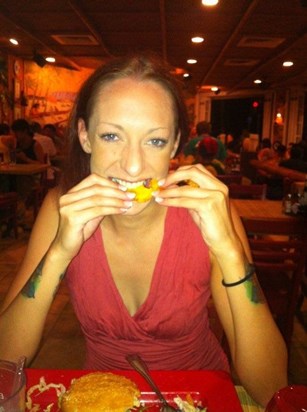 Eating pineapple at Cheeseburger in Paradise-Oahu