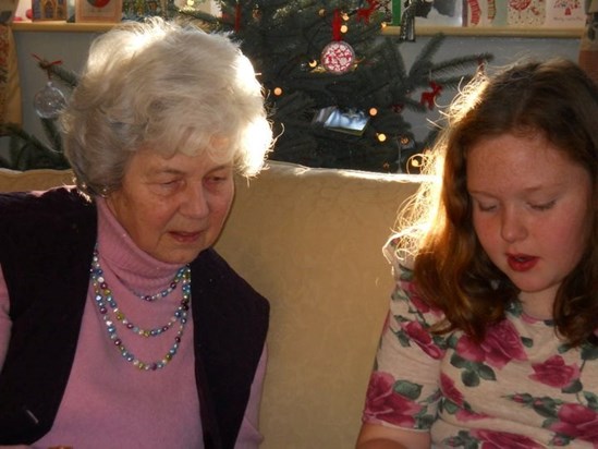 Having a good old read with Octavia - Boxing Day in Skenfrith, circa 2010