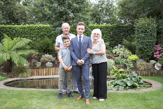 Janet with her husband John and two grandsons Jake and Archie, for jakes Prom