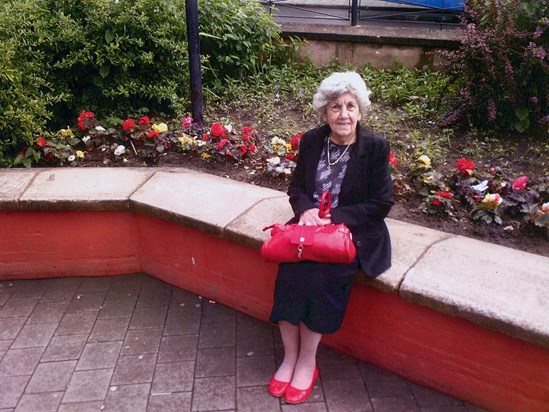 New red shoes and matching handbag