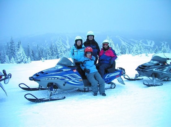 Snowmobiling in Winter Park, Colorado with Susan, dad, mum and Emma