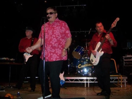 Roy on stage with The Cadillacs