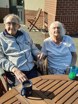 Mum and Dad together at Kingfisher Court . Tea and chat in the garden 