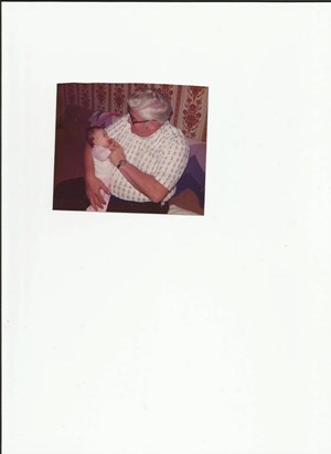 Shana about 2 months old with her paternal grandfather